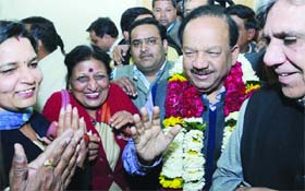 BJP state president Dr. Harsh Vardhan with party supporters at his office after taking the charge of new post in New Delhi on Thursday