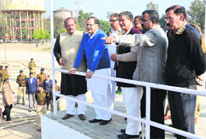 Chief Minister Harish Rawat inspects the preparations at the Parade Ground for Rahul Gandhis upcoming rally, in Dehradun on Thursday. 