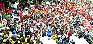 Members and supporters of the Centre of Indian Trade Unions take out a march in Ludhiana on Thursday
