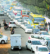 Traffic moves at a snails pace outside the venue of APICON-2014, in Ludhiana on Thursday