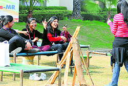 Girls get themselves clicked at Rangla Punjab, a mini-village set up during the 69th Annual Conference of the Association of Physicians of India, in Ludhiana on Thursday