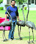 Harminder Singh Boparai with one of his creations displayed at the venue