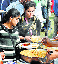 Visitors at a food court at Rangla Punjab in Ludhiana on Thursday