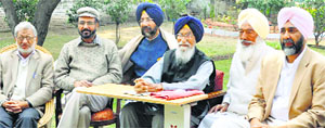Manpreet Badal, Surjit Singh Barnala and other Sanjha Morcha leaders at a meeting in Chandigarh on Thursday.
