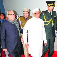 Chief Minister Bhupinder Singh Hooda escorts Governor Jagannath Pahadia to the Vidhan Sabha on the opening day of the Budget session in Chandigarh on Friday. Tribune photo: Manoj Mahajan