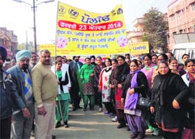 FOR A CAUSE: Officials of the Health Department hold a polio awareness rally in Amritsar on Saturday