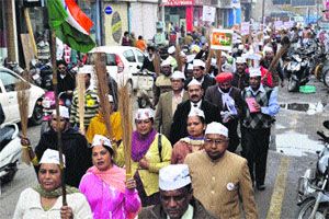 Aam Aadmi Party workers take out Jhadu Yatra in Bathinda on Saturday.