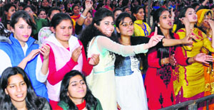 Students enjoy the performance of Punjabi singer Diljit Dosanjh during the CU Fest on Saturday.