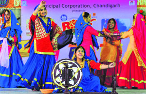 Students perform Giddha at the Rose Festival on Saturday in Chandigarh.