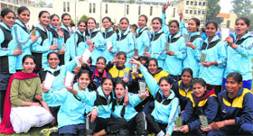 Students of Khalsa College for Women in a jubilant mood after receiving trophies at the annual sports meet in Jalandhar on Saturday.