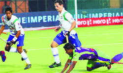 Delhi Waveriders, UP Wizards in action on Saturday. Tribune photo