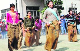 Sack race: Students participate in a sports meet at DAV College in Amritsar