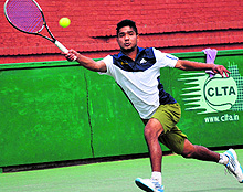 A player returns a shot during the ITF Mens Futures International Tennis Tournament in Chandigarh on Sunday