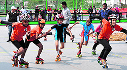 Children compete in a skating event