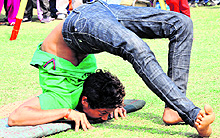 Gatka players perform martial art during the Rose Festival in Chandigarh on Sunday