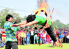 Gatka players perform martial art during the Rose Festival in Chandigarh on Sunday