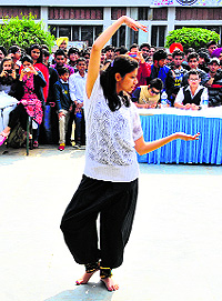 A girl presents an item