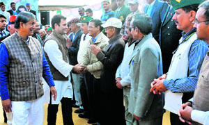 Congress national vice-president Rahul Gandhi interacts with ex-servicemen in Dehradun on Sunday.