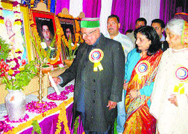 Speaker BBL Butail garlands the photo of martyr Vikram Batra, PVC, during his visit to a college named after him at Palampur on Saturday. 