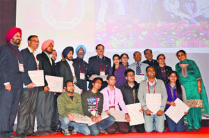 Doctors felicitated on the concluding day of APICON 2014 pose for a photograph in Ludhiana on Sunday.