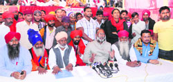 Members of various Dalit organisation address mediapersons at Ram Tirath in Amritsar on Monday. photo: Vishal Kumar