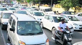 Vehicles stranded in traffic jam on a busy road in Bathinda.