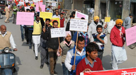 Members of students union hold a protest rally in Bathinda on Monday.