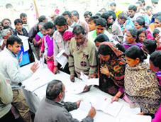 Voters being enrolled at a special camp near the demolished Colony No. 5 in Chandigarh. 