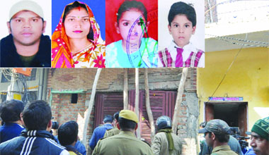 The police outside the residence of  a family found dead at Vikas Vihar in New Delhi on Monday.