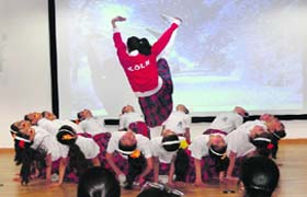 Students perform during the Cologne festival at Unison School in Dehradun on Monday