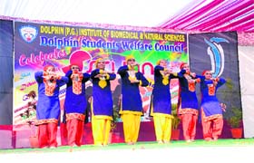 Students perform a Kashmiri dance at the annual function of Dolphin institute in Dehradun on Monday