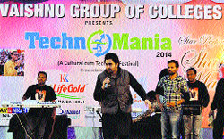 Punjabi singer Sherry Mann performs at Techno-Mania-2014 at a Thapkor college in Nurpur on Sunday. Photo: Rajiv Mahajan