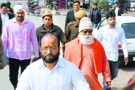Four accused in the Samjhauta blast case come out of the court in Panchkula on Monday. 