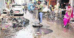 Blocked sewerage at Gur Mandi in Jalandhar.