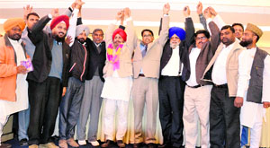 The Bahujan Samaj Party members celebrate the announcement of Kulwinder Singh Khosa (garlanded) as the party's candidate in Ludhiana on Monday.