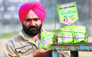 Jagwant Singh Rai shows his product: