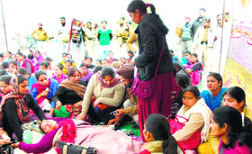 Members of the Staff Nurse Employees' Union protest at Lambi village in Muktsar district on Monday.