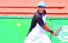 A player returns a shot during the DLF-ITF Mens Futures International Tennis Tournament at the CLTA courts in Chandigarh on Tuesday.