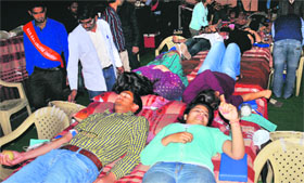 Volunteers donate blood at a camp organised by the NSS unit of DAV College, Sector 10, in Chandigarh on Tuesday.