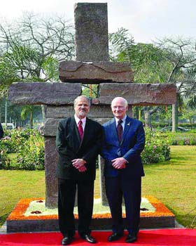 Lieutenant Governor Najeeb Jung and  Governor General of Canada Devid Johnston pose after unveiling a Canadian stone sculpture Inukusk at a roundabout on Shanti Path in New Delhi on Tuesday
