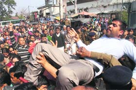 Protesting shiksha mitras being prevented from moving towards the Chief Ministers residence in Dehradun on Tuesday