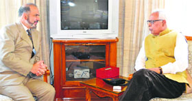 Governor NN Vohra with Kashmir Society chairman Farooq Renzu Shah at Raj Bhawan in Jammu on Tuesday.