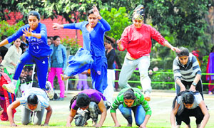 Students take part in fun game during the two-day sports meet at the Guru Nanak Khalsa College for Women, Gujarkhan Campus, Model Town, in Ludhiana on Tuesday.