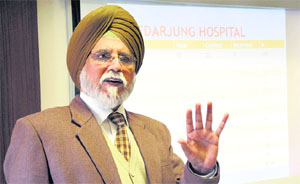 Dr Balbir Singh Shah addresses a gathering at Guru Tegh Bahadur Hospital on Tuesday.