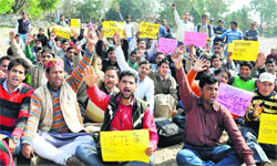 Unemployed B.Ed trained youth protest at Parade Ground in Dehradun on Wednesday. A Tribune photograph
