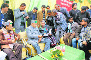 Chief Minister Virbhadra Singh listens to the problems of people at Sundla in the Salooni area on Tuesday. 