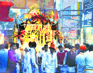 On the call of faith: Devotees take out a Rath Yatra on the eve of Mahashivratri in Ludhiana on Wednesday. 