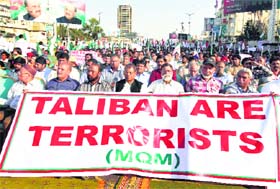 Supporters of Pakistan's Muttahida Quami Movement at a rally to show their solidarity with armed forces, in Karachi