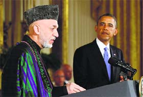 Terse message: US President Barack Obama with his Afghan counterpart Hamid Karzai in Washington