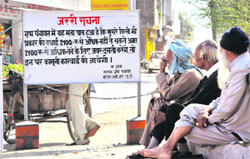 A board installed by the Khuda Ali Sher panchayat informing villagers about its decision on money to be paid to eunuchs. Tribune photo: S Chandan